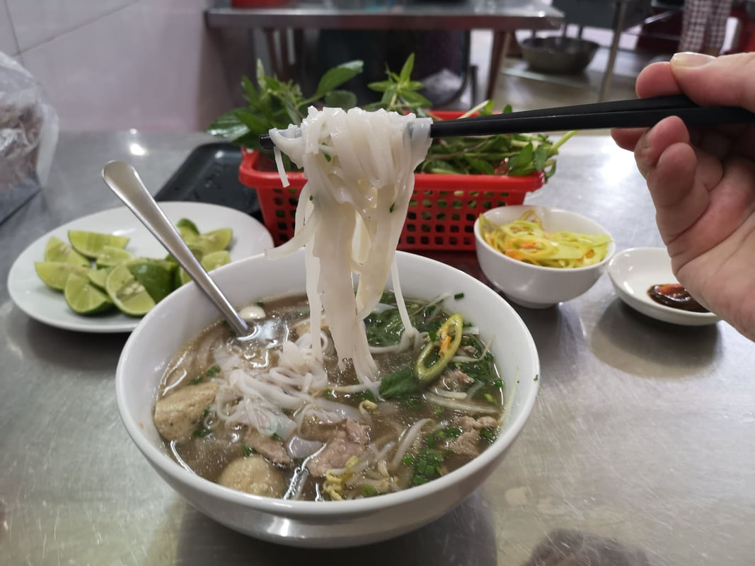 A steaming bowl of Pho