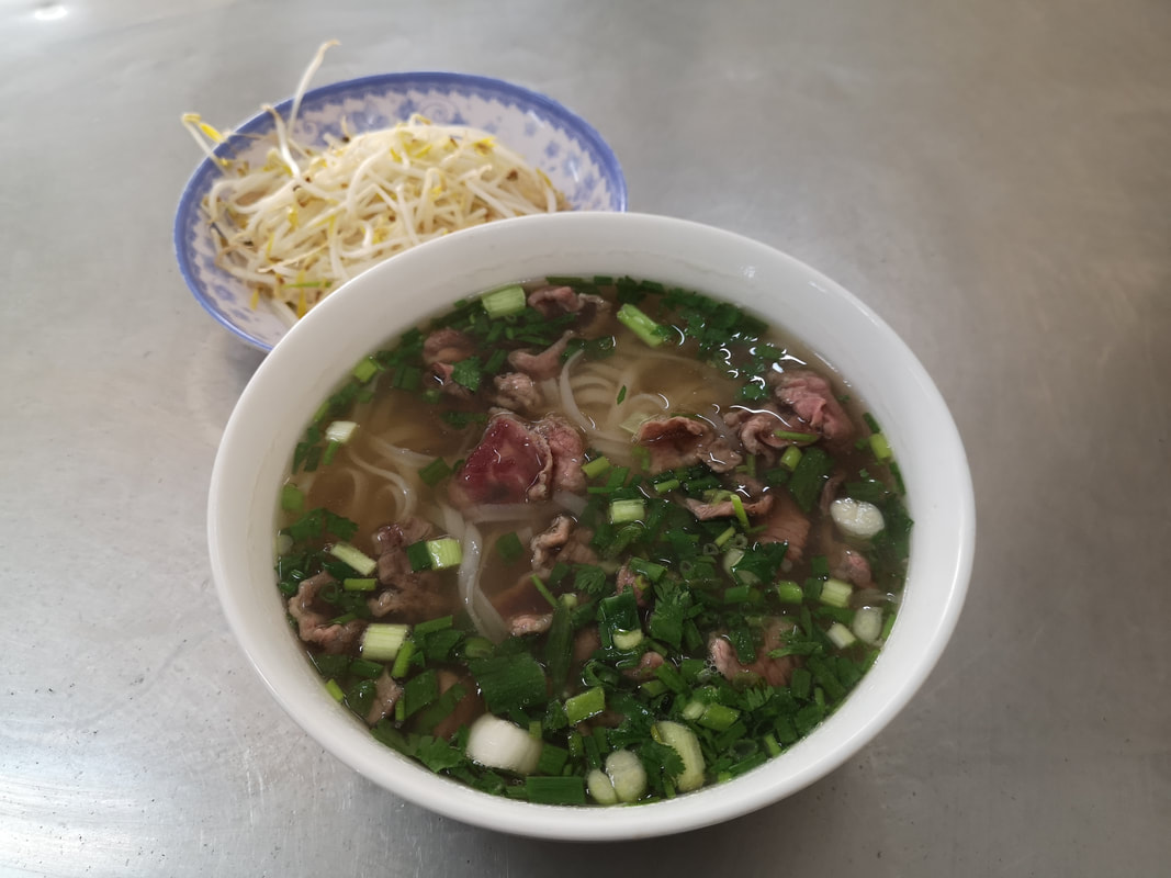 A steaming bowl of Pho in Danang.